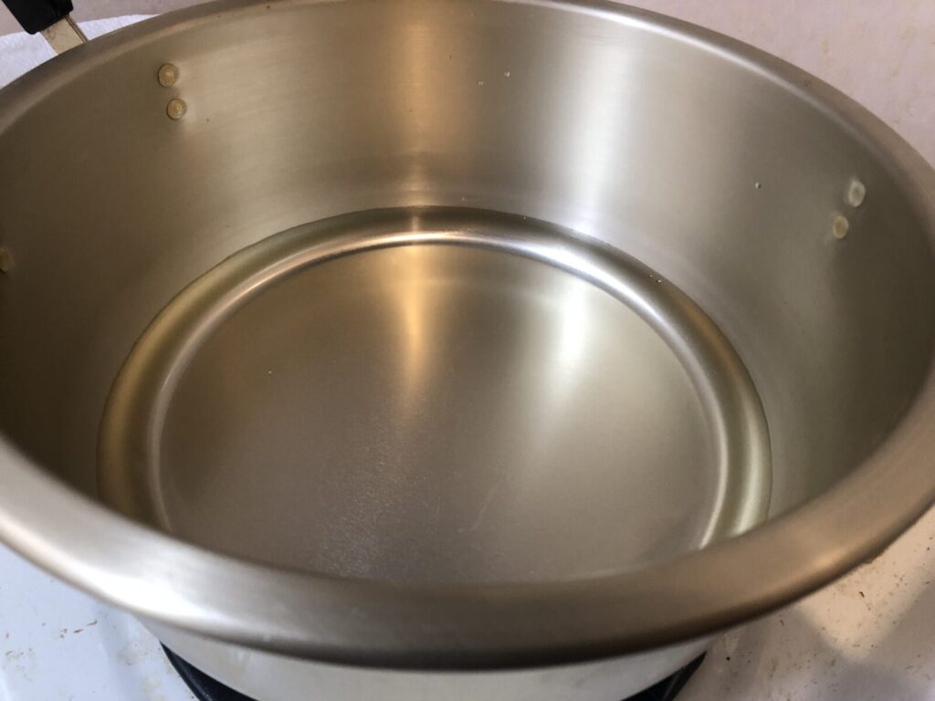 Boil water in a pot.