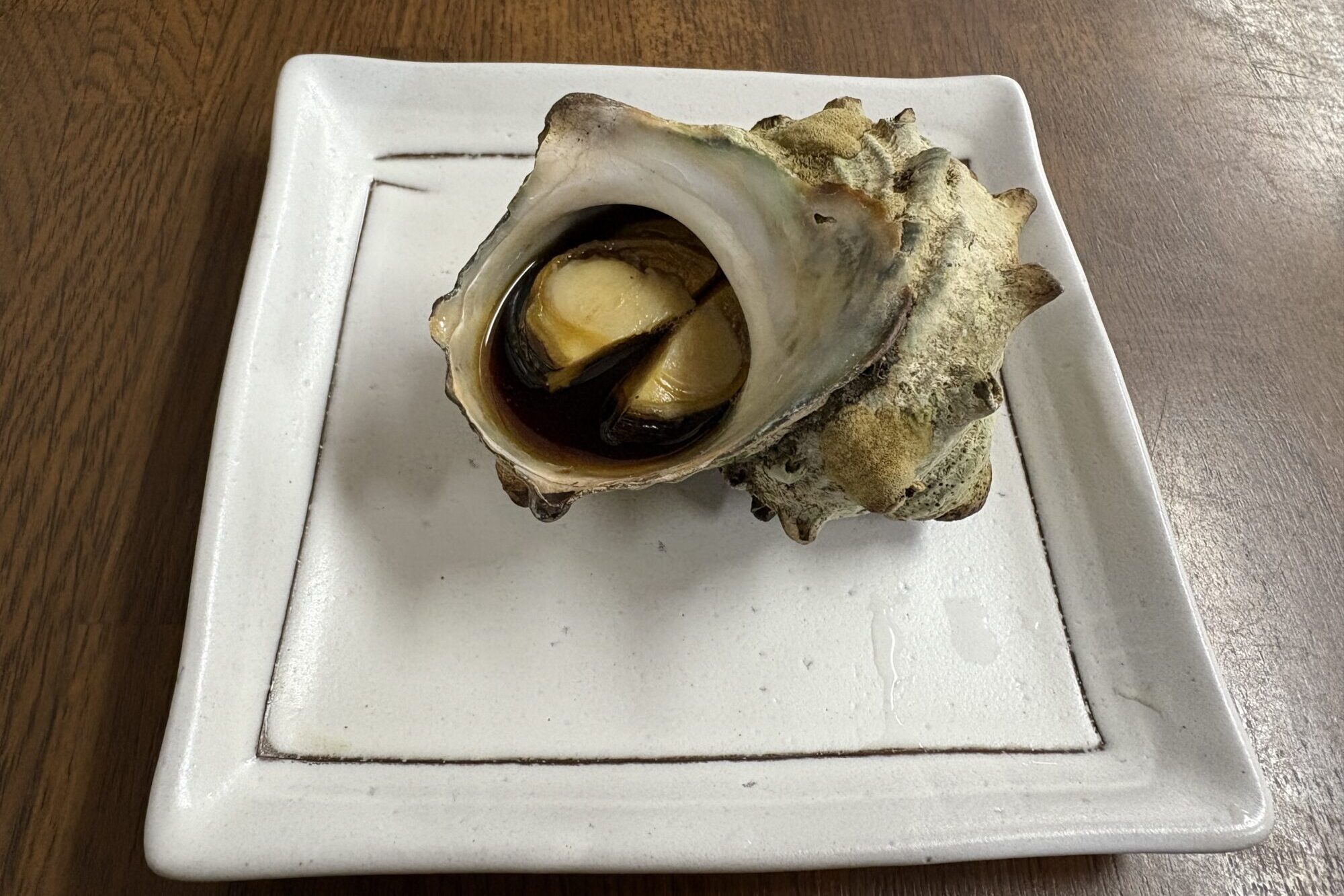 Grilled turban shell at Nakanishi Shokudo
